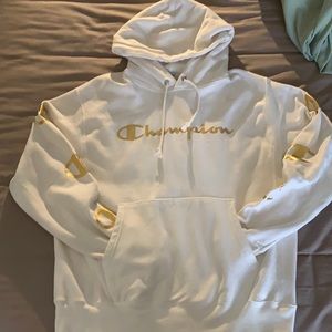 White and gold champion sweater